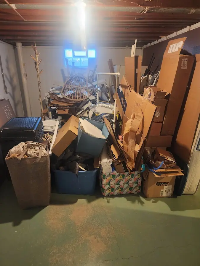 Roll-off dumpster container at job site for Yard Waste Dumpster Rental in Hokes Bluff